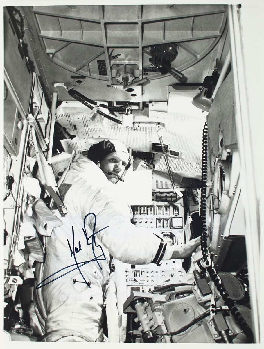 Signed photo of Neil Armstrong aboard a Lunar Module Simulator about a month before the launch in 1969. Source: Christie's New York