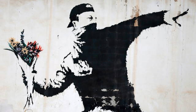 Banksy Spring Who Is Banksy? A Look at the Artist’s Work and Influence