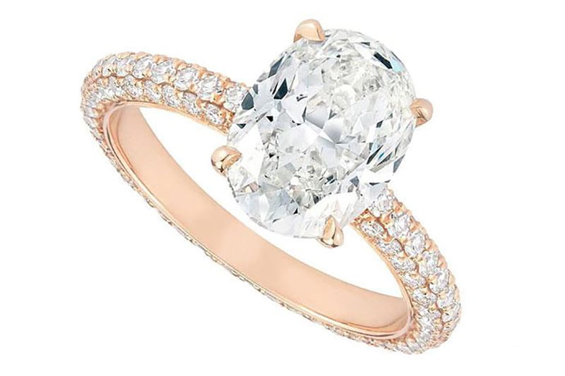 Engagement ring with a four-prong setting