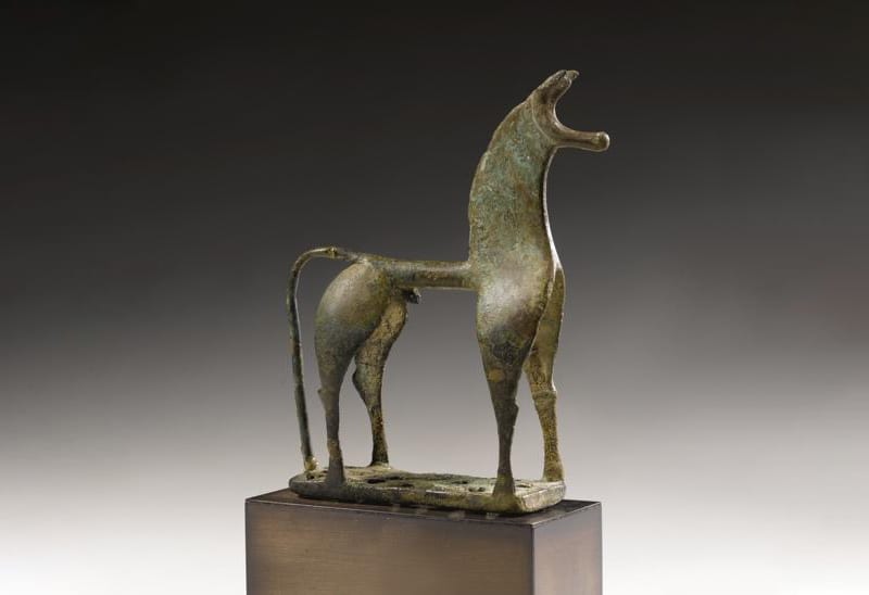 A Greek Geometric Bronze Figure of a Horse