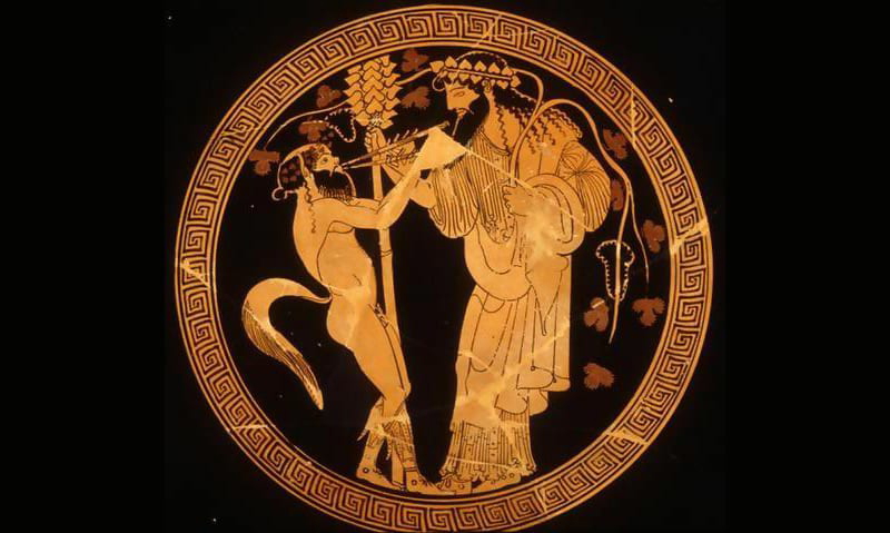 Satyr and Dionysus, Athenian red-figure kylix C5th B.C.