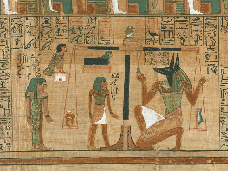 Heart of a man being weighed against a feather on a scale.