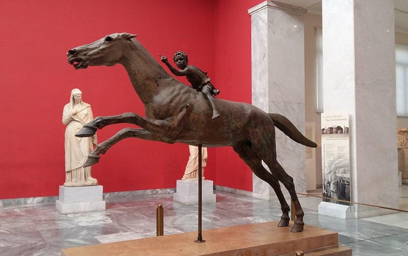 A bronze statue of a child riding a horse from the Hellenistic period from the National Archaeological Museum of Greece in Athens