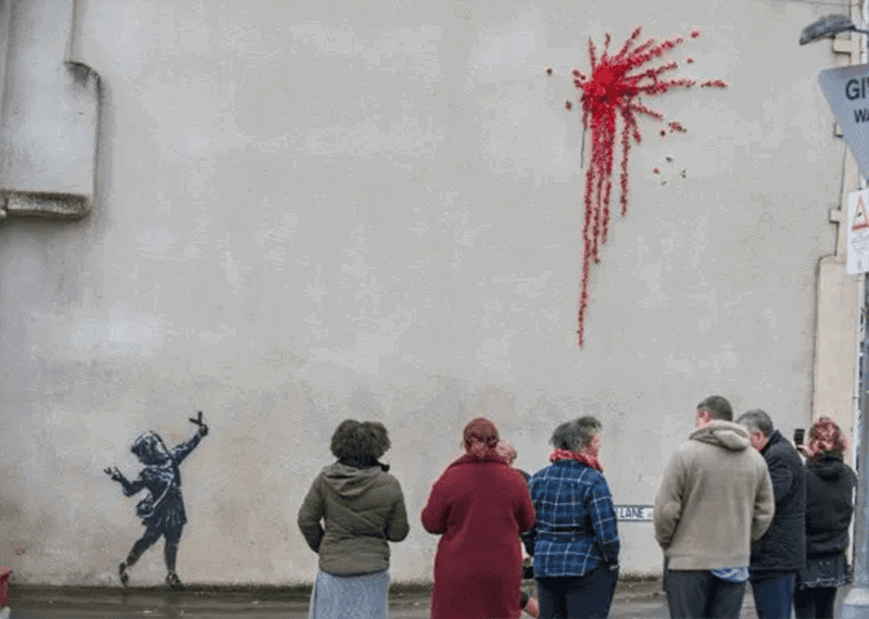 Crowds form in Bristol to see Banksy’s Valentine’s Day mural 