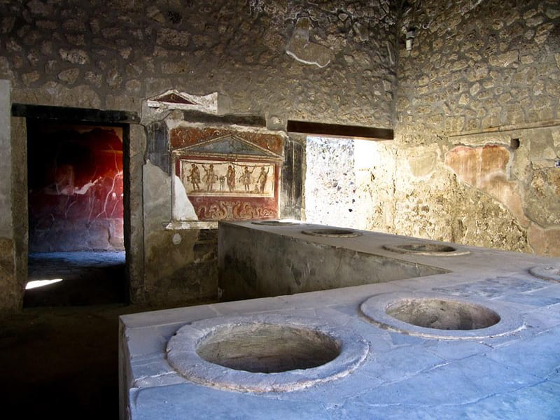 A thermopolium – an ancient fast-food shop in Pompeii, via Hiveminer