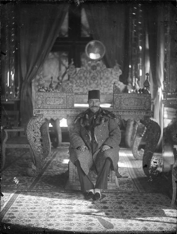 Nasir al-Din Shah Sitting On the LowerStep of Takht-I Tavroos or the Peacock Throne, Antoin Sevruguin, c. 1900, Smith College