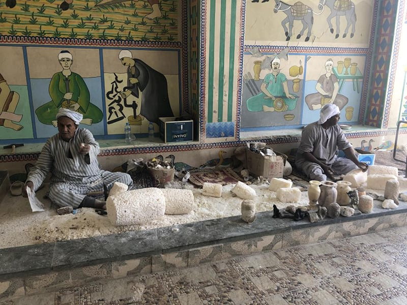 Craftsmen at work outside alabaster factory, via Foto Freen
