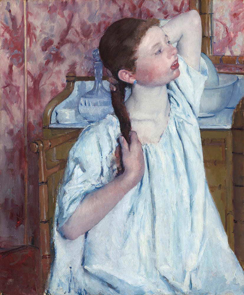 Girl Arranging Her Hair by Mary Cassatt, 1886