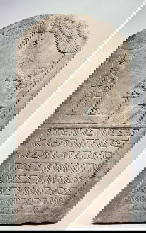 Limestone stele of Cleopatra Making an Offering to Isis,