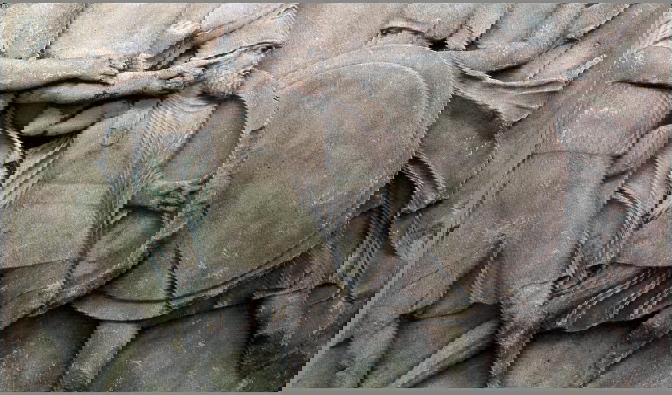 A stone relief of Spartans in battle