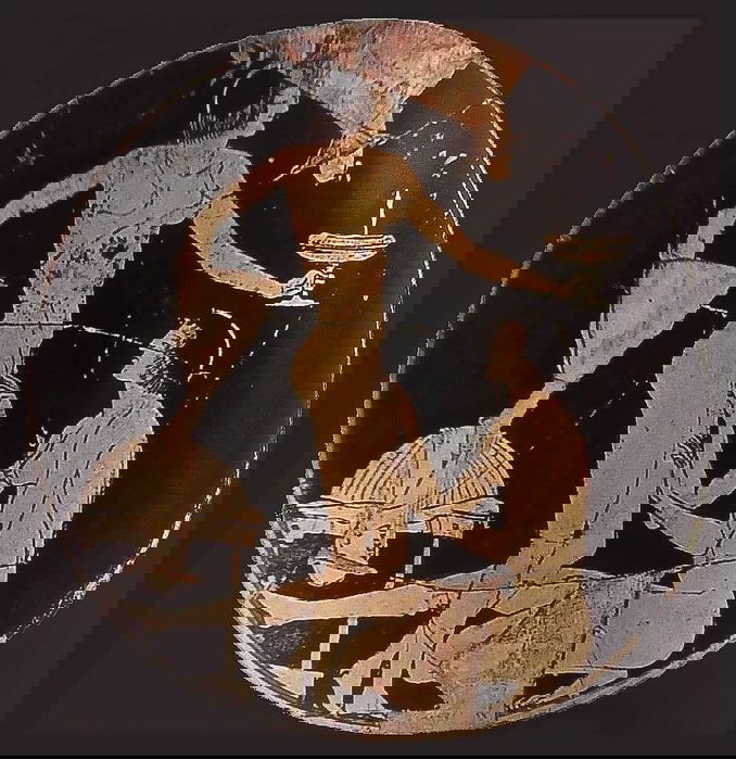 red figure vase with two men