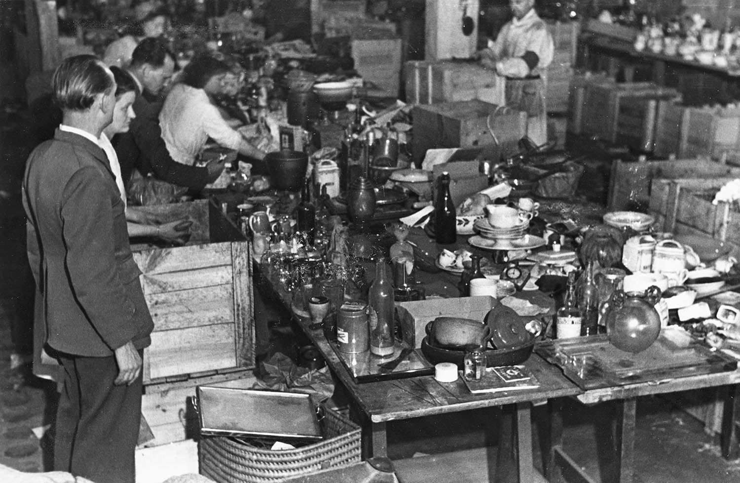Inmates Lévitan labour camp sorting Nazi looted home furnishings ERR