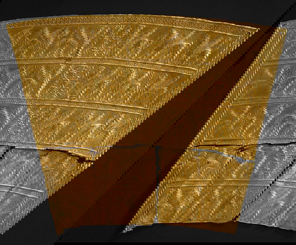 gold plaque winged creatures