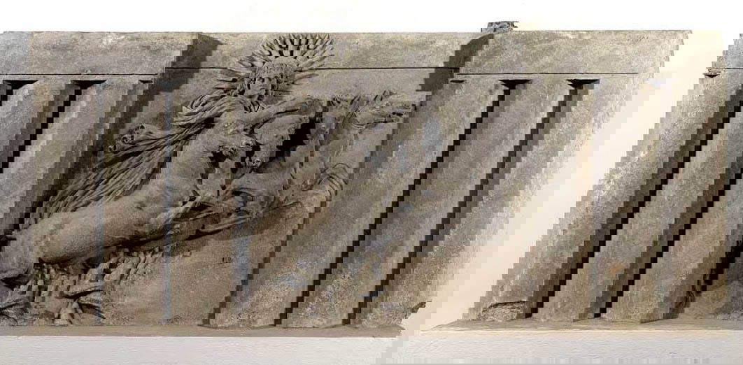 helios sol driving chariot relief