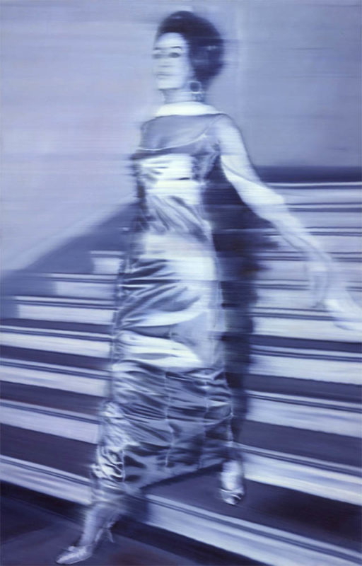 woman descending staircase