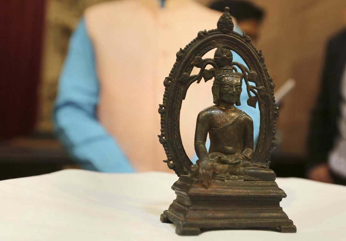 stolen statue buddha