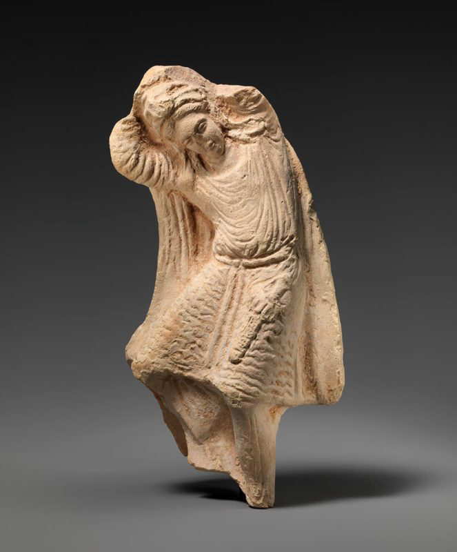 terracotta statuette dancing youth