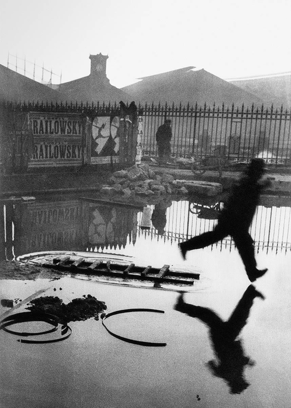 documentary photographs cartier bresson man puddle
