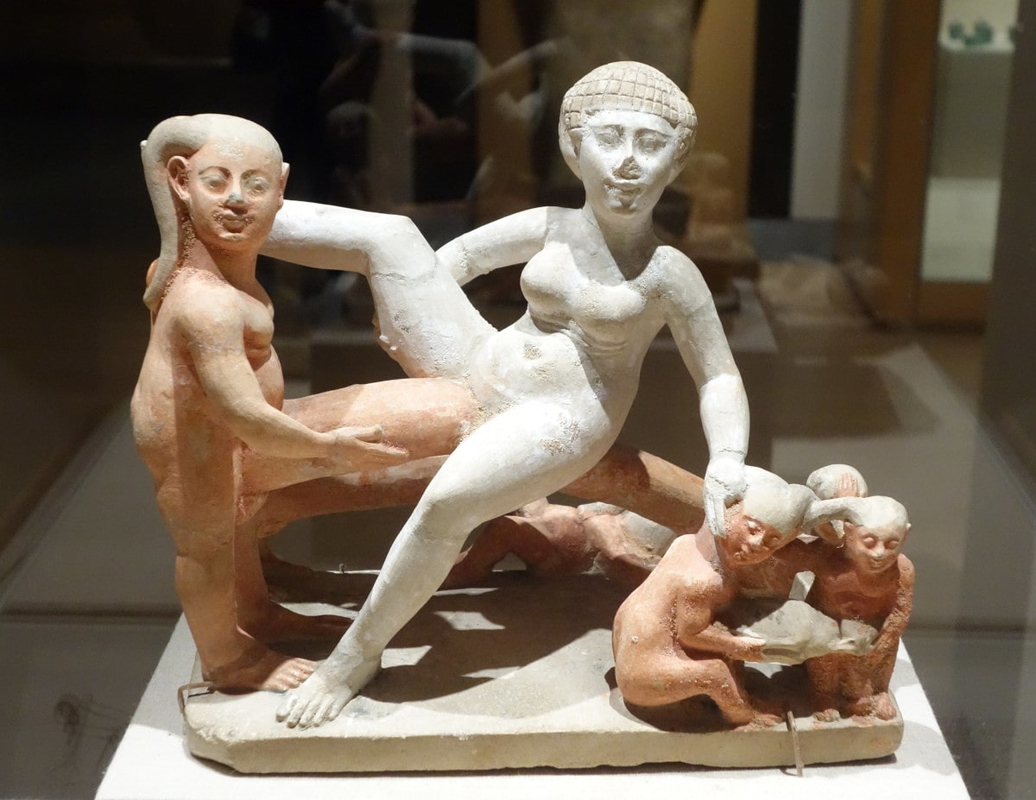 sexual limestone statue group