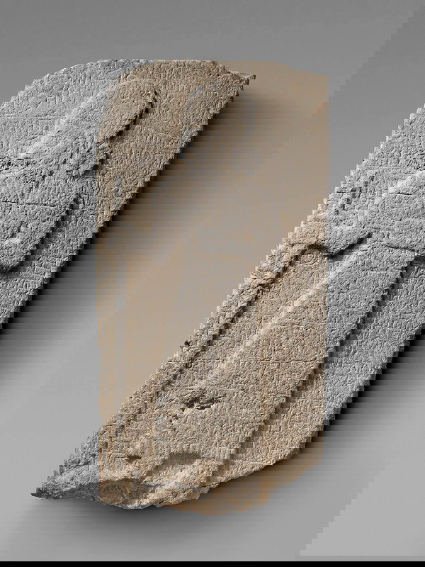 beared figure staff relief