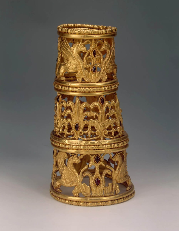 cone palmettes lotuses griffins