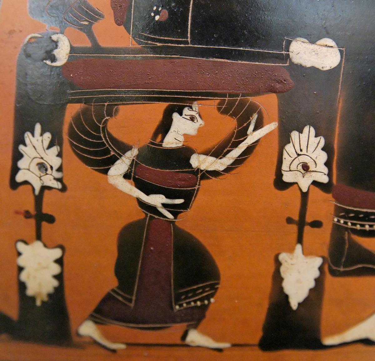 Detail on black figure pot showing a winged Mets beneath the throne of Zeus, Athens, c. 550-525 BCE. Source: Louvre