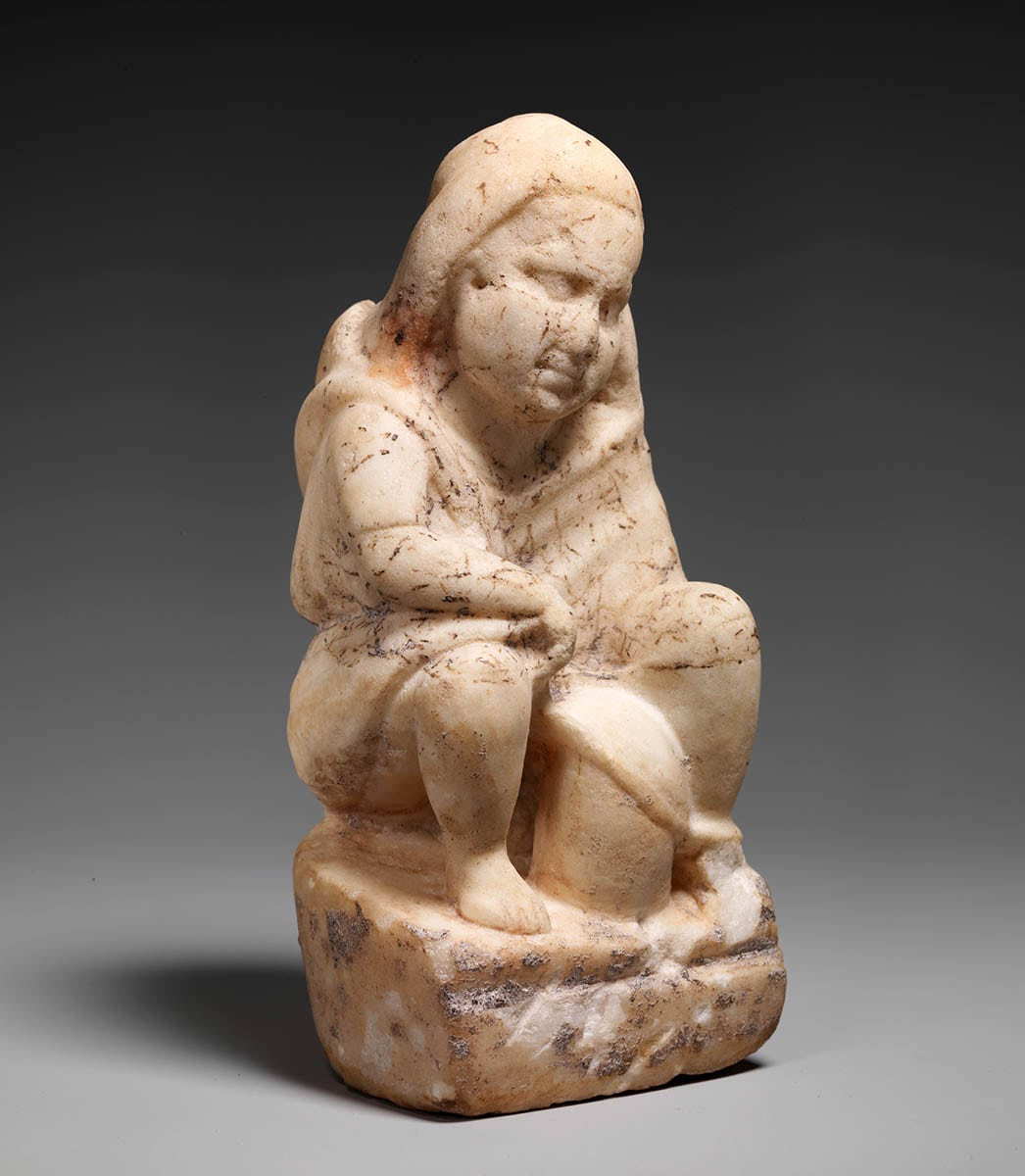 roman slave boy marble statuette