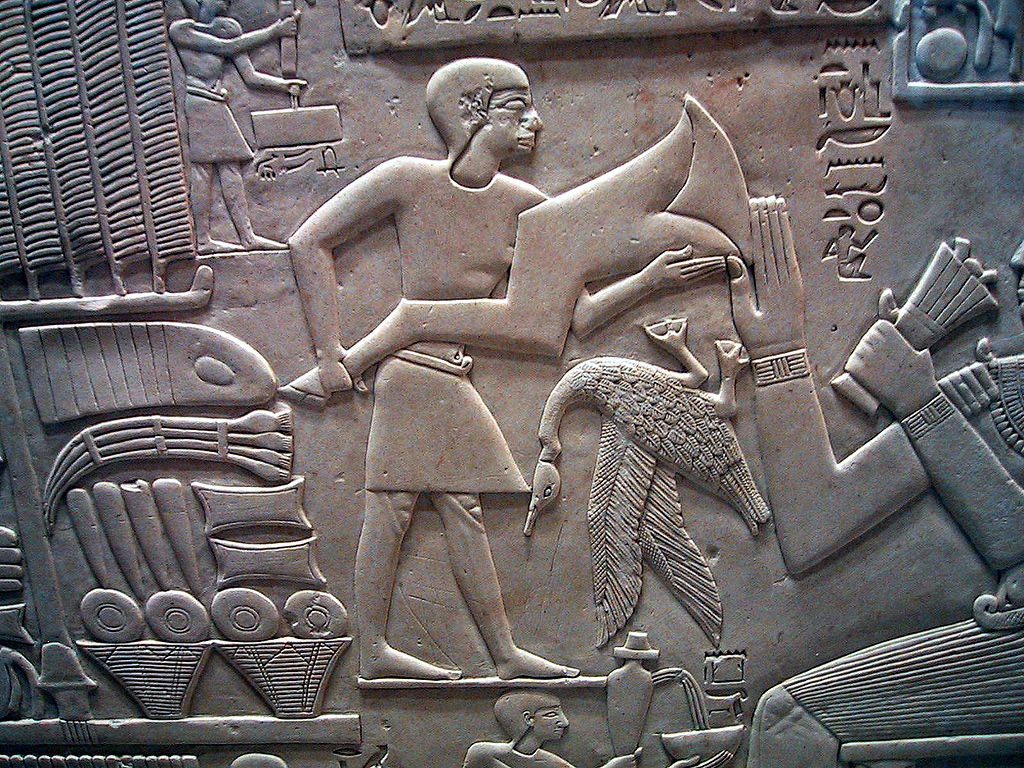 man offering foreleg of ox