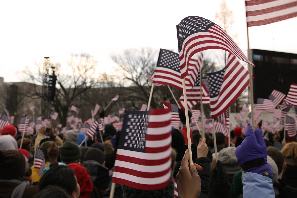 american dream crowd with flags photo