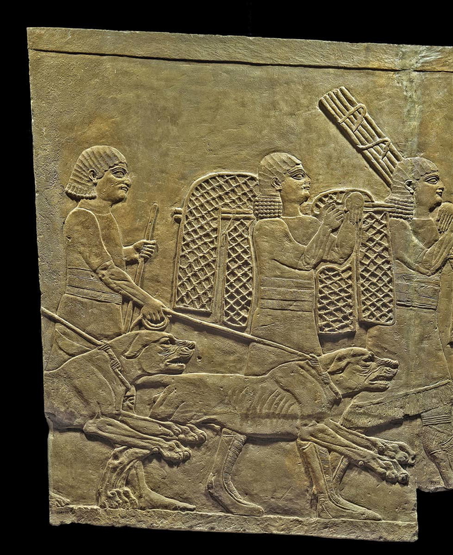 assyrian empire men dogs