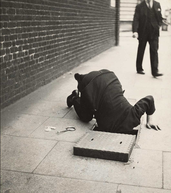 dora maar man sidewalk inspection