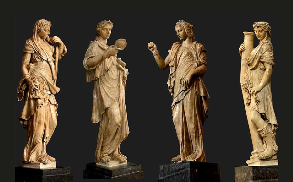 four virtues statues