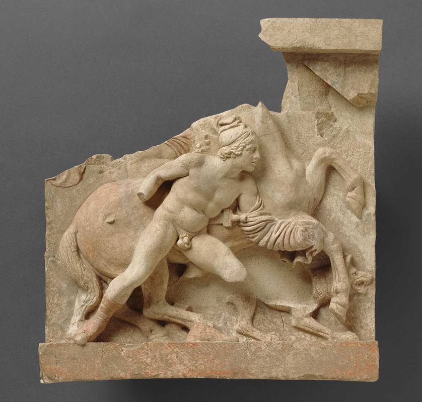 relief of a horseman and dog