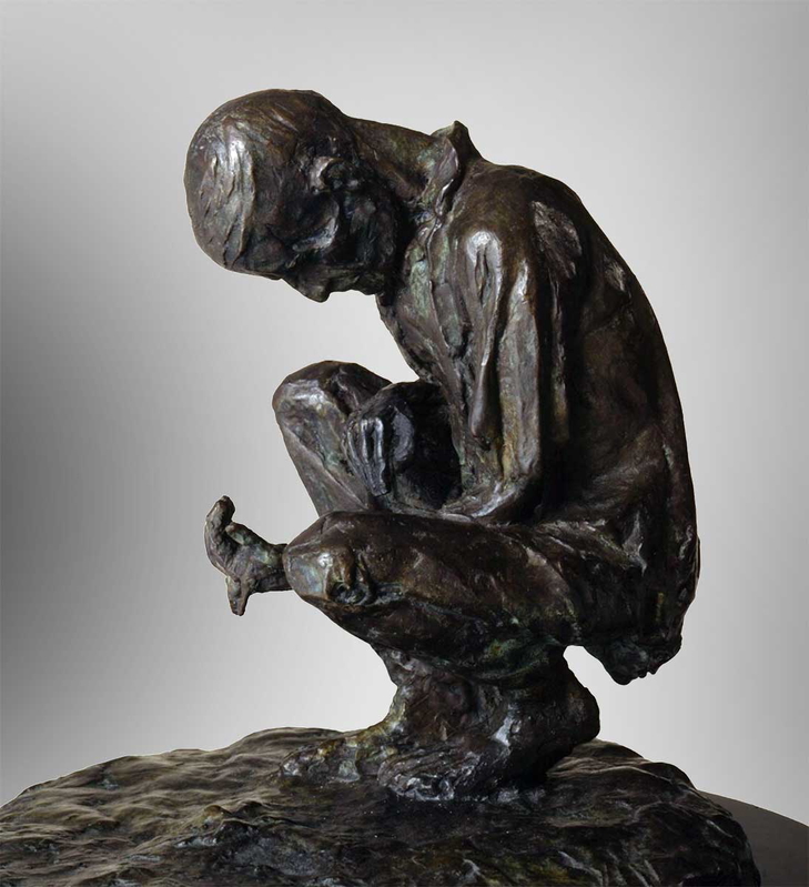 man sifting through soil irish famine museum