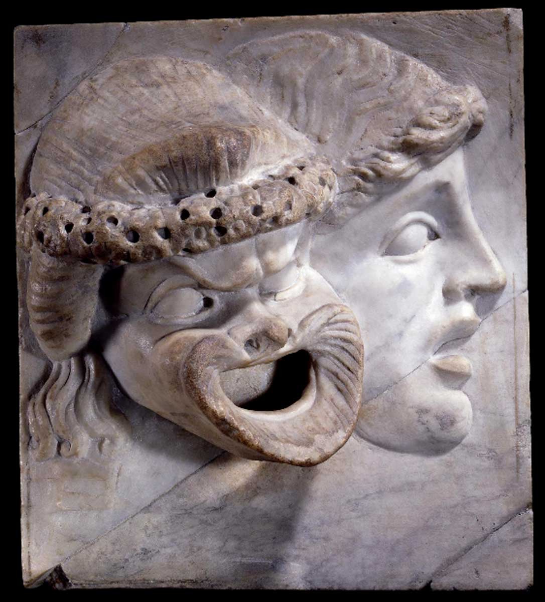 tragic and comedic masks marble relief