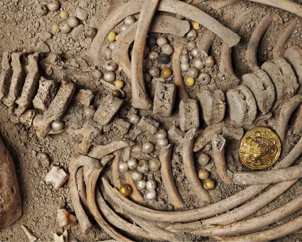 viking burial beads skeleton sweden