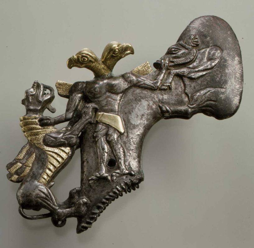axe head with creatures