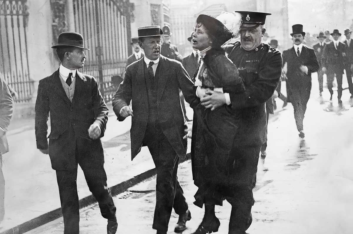 WSPU leader Emmeline Pankhurst is manhandled by police outside Buckingham Palace while attempting to deliver a petition to King George V, Source: Wikimedia Commons