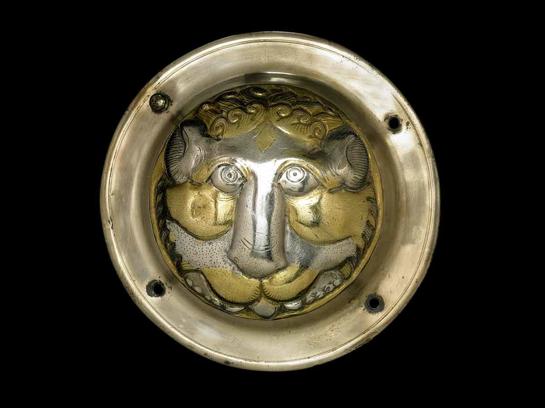 silver boss with lion head