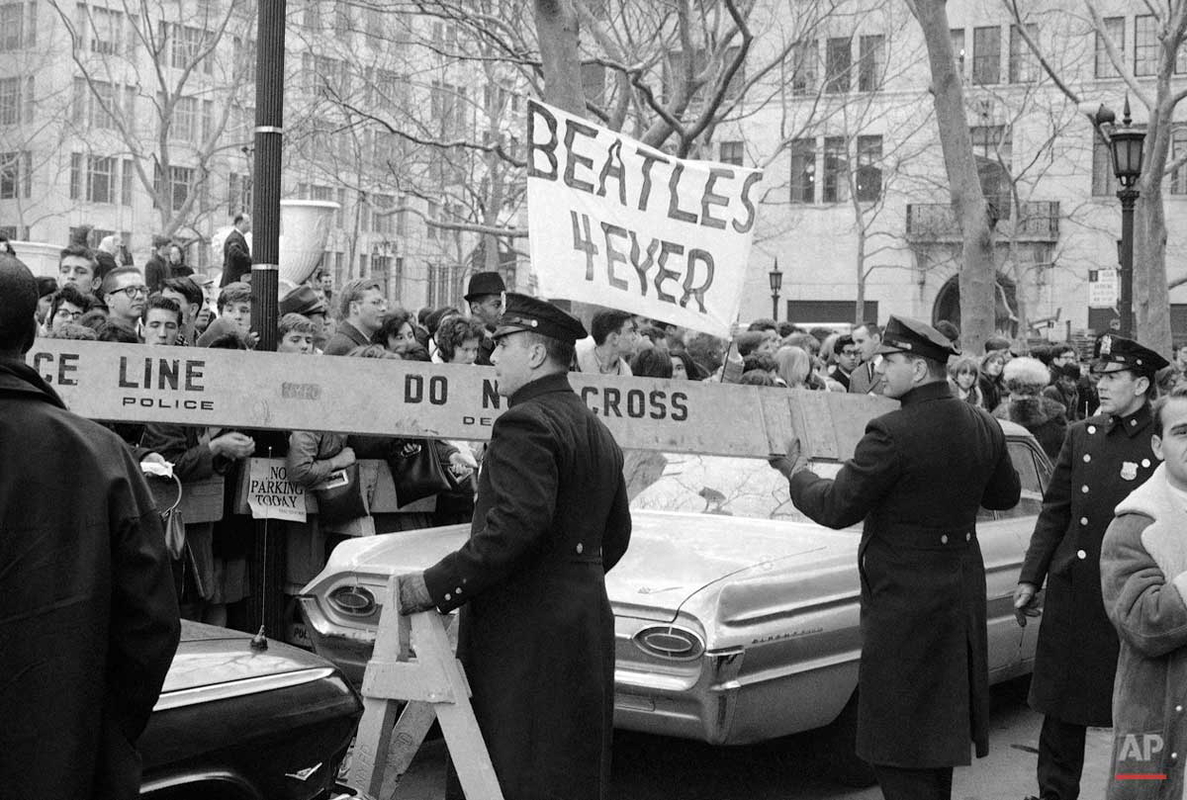 police beatlemania fans barricades plaza hotel 1964