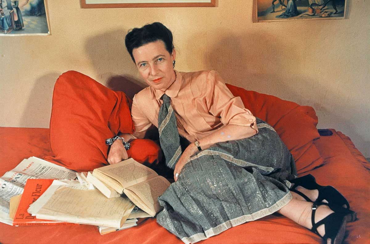 simone de beauvoir with books