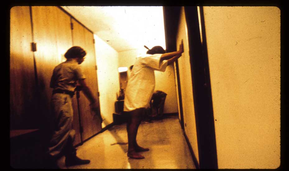 stanford prison experiment prisoner against wall