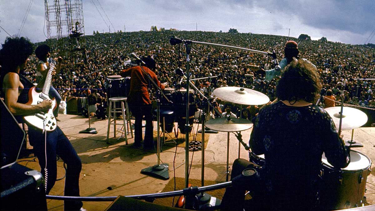 woodstock music festival performance large audience 1969