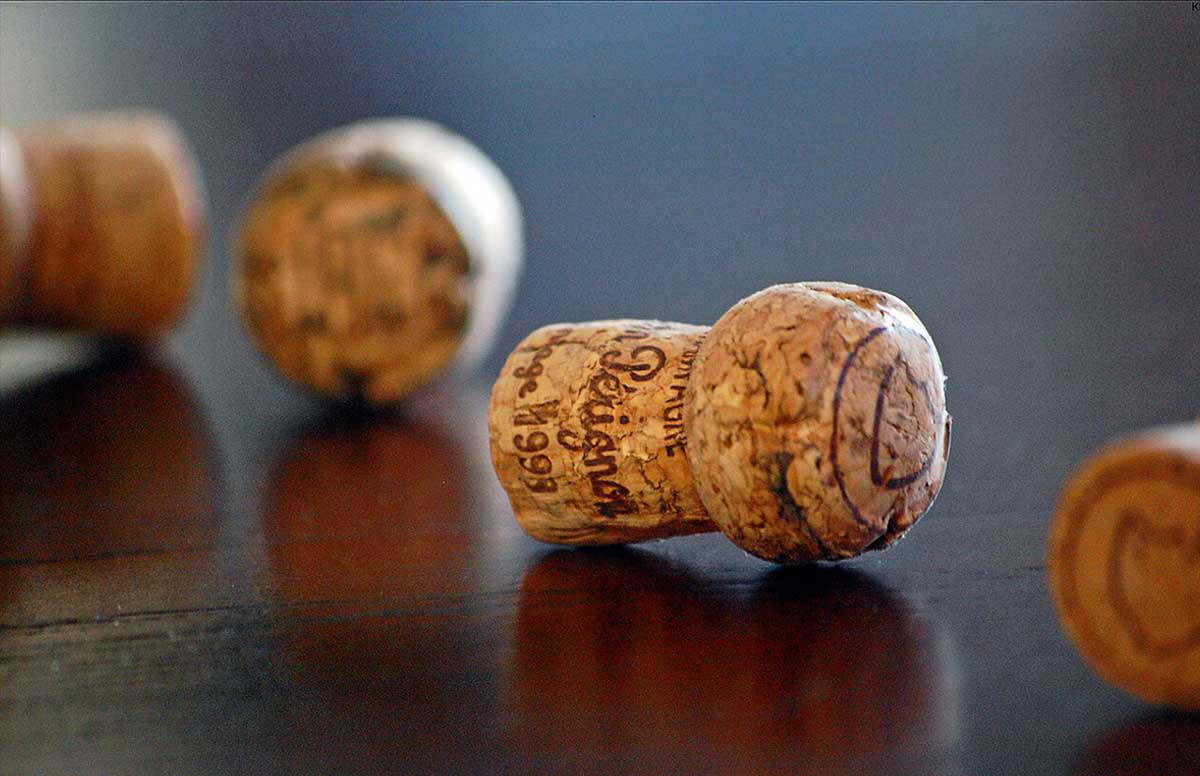 Corks from bottles of Dom Pérignon Champagne, via Wikimedia Commons