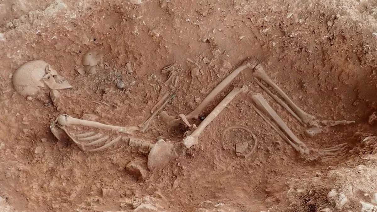 anglo saxon burial woman cradling baby