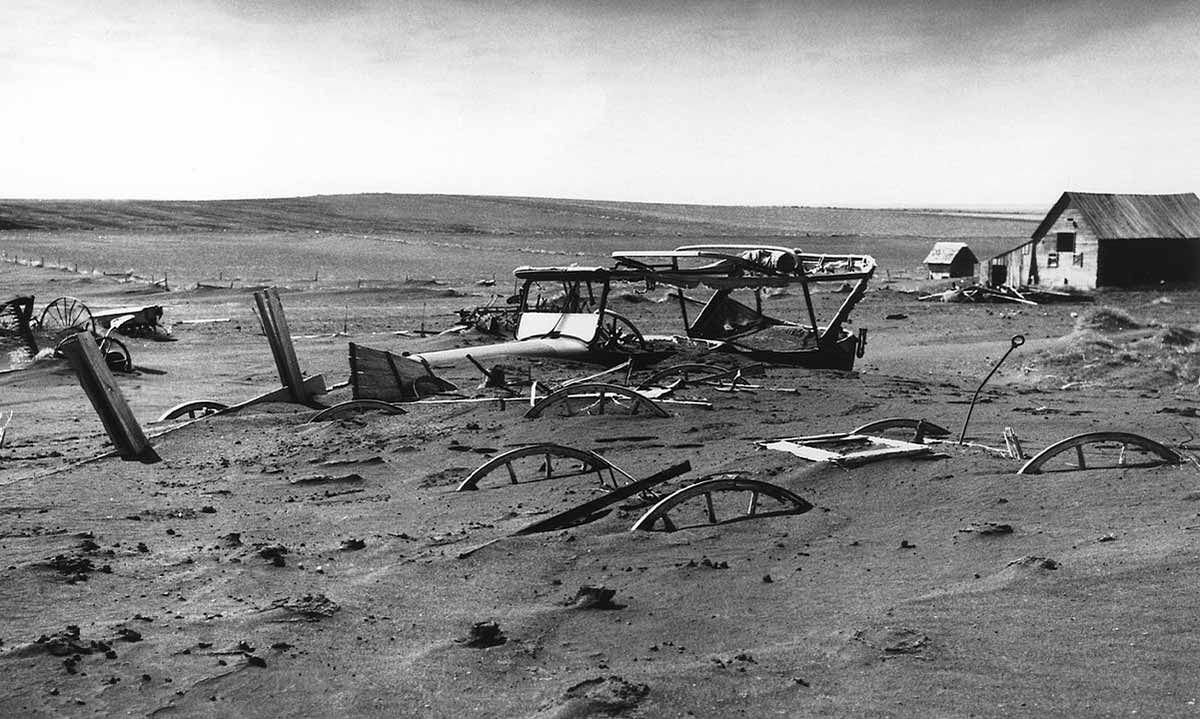 dust bowl dirt buried farming equipment