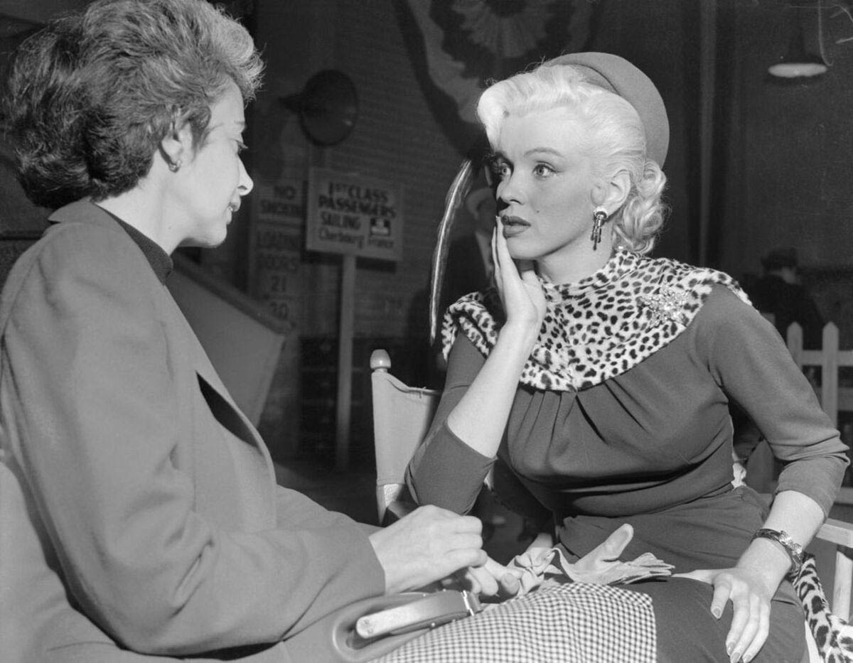 marilyn monroe listens to her drama coach natasha lytess.jpg