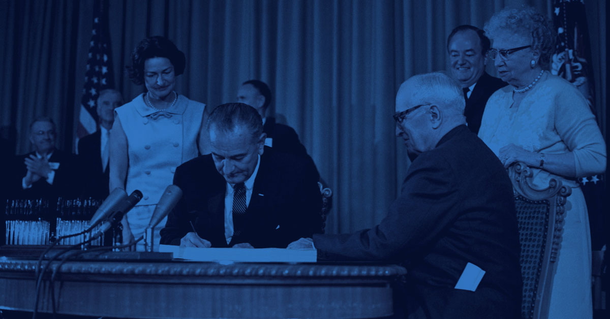 johnson signs medicare and medicaid 1965