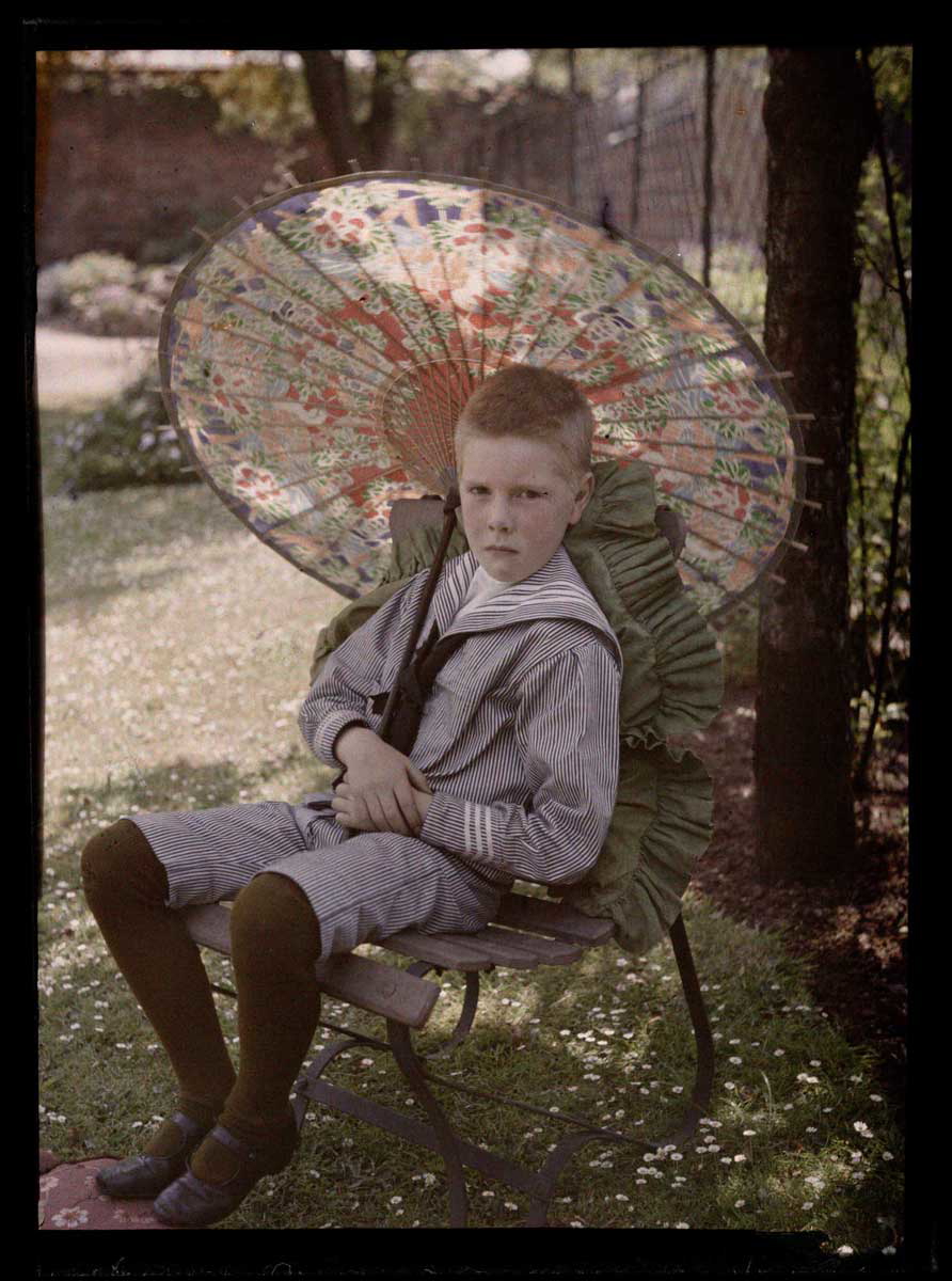 anon boy with parasol