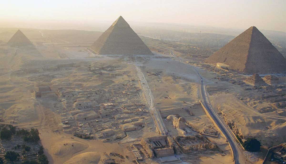 general view giza plateau pyramids sphinx